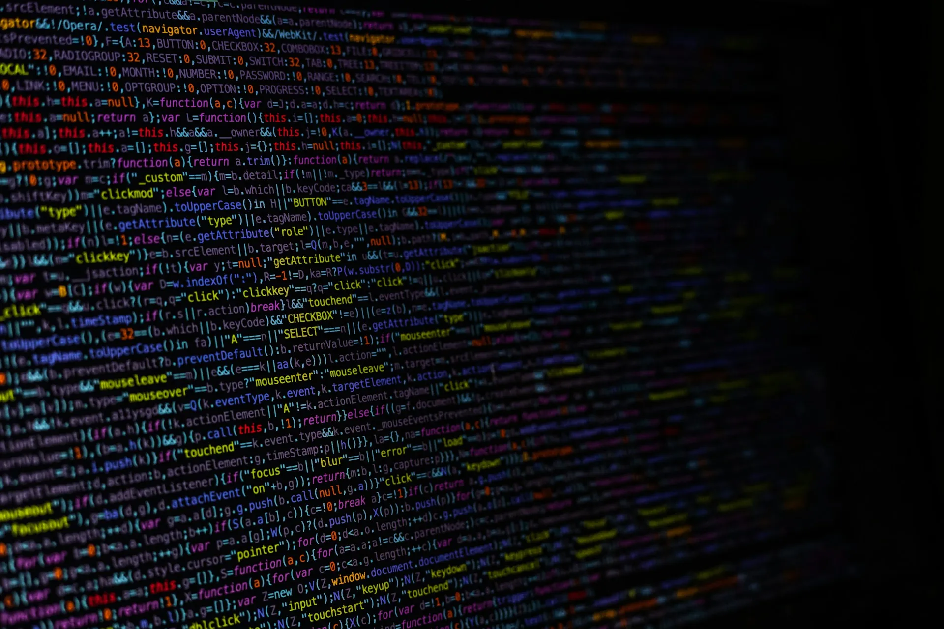 Close-up of source code on a dark screen